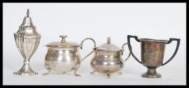 A group of silver to include a hallmarked silver lidded table salt / mustard pot condiment, silver