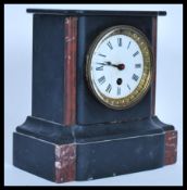 A 19th century Victorian French slate clock, having enamel face with roman numeral chapter ring,