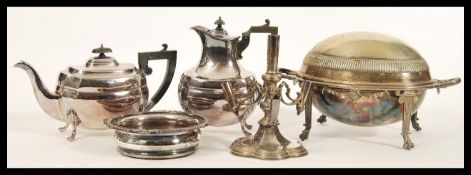 A group of Walker and Hall silver plate to include a matching teapot and hot water jug, epergne on