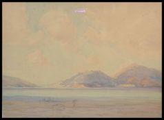 An early 20th Century watercolour painting depicting a coastal scene Porto Veneri being framed and