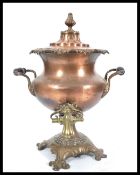 A 19th Century Georgian Regency copper samovar raised on scrolled acanthus leaf base having brass