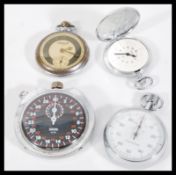 A selection of vintage pocket watches to include a Smiths stop watch having a black face with with