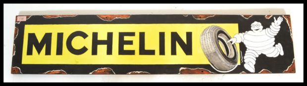 A contemporary artist's impression of a vintage enamel advertising sign for Michelin Tyres, the