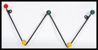 A vintage retro mid 20th Century sputnik atomic space age set of coat hooks of W zig zag form having