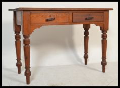 A 19th Century Victorian pitch pine and oak bookcase on stand / writing table desk having bookcase