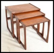 A G-Plan retro teak wood 1970's graduating nest of tables in the Quadrille pattern. The tables
