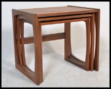 A G-Plan retro teak wood 1970's graduating nest of tables in the Quadrille pattern. The tables