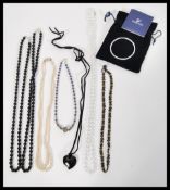 A COLLECTION OF COSTUME JEWELLERY