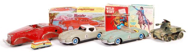 COLLECTION OF ASSORTED VINTAGE TINPLATE CLOCKWORK TOYS