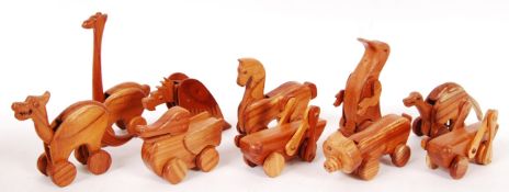 CHESTER WEDGEWOOD'S HAND MADE CARVED ANIMAL TOYS