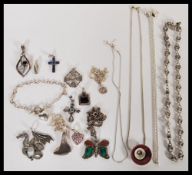 A group of sterling silver necklaces and pendants