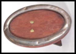 A silver hallmarked mahogany backed easel mirror o