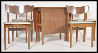 A vintage retro 20th Century teak drop leaf dining