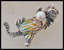 A stamped 925 plique a jour silver brooch / pendan