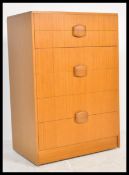 A retro 20th Century Danish inspired teak wood che