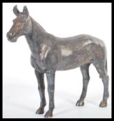 An early 20th Century silver plated figurine in th