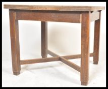 A vintage 20th Century draw leaf refectory dining