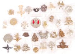 LARGE COLLECTION OF ASSORTED MILITARY CAP BADGES