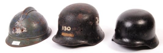 COLLECTION OF WWI & WWII STEEL UNIFORM HELMETS