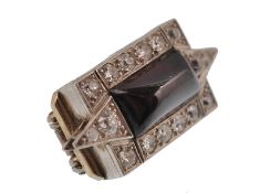 An early 20th century gold and diamond brooch. The