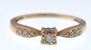 A 9CT GOLD HALLMARKED LADIES DIAMOND SOLITAIRE RING
