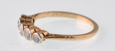 An early 20th century gold and diamond 5 stone ring. The diamonds approx 0.55ct total. The graduated