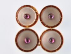 A pair of French early 20th century gold, ruby and mother of pearl enamel round gentleman's cuff
