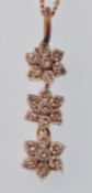 AN 18CT GOLD AND DIAMOND LADIES NECKLACE PENDANT AND CHAIN