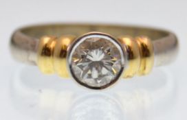 18CT GOLD AND DIAMOND SOLITAIRE RING