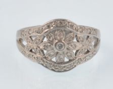 A HALLMARKED 18CT WHITE GOLD DIAMOND FLOWER HEAD R