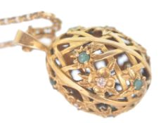 IGOR CARL FOR HOUSE OF FABERGE 14CT GOLD DIAMOND AND EMERALD EGG PENDANT ON CHAIN