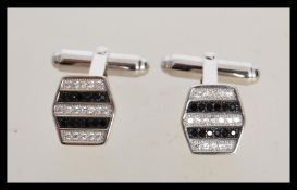 A pair of stamped 925 silver hexagonal cufflinks s