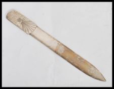 A hallmarked 20th Century silver large page turner