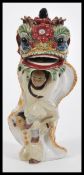 An unusual 20th Century Chinese pottery figurine d