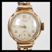 A vintage hallmarked 9ct gold ladies cocktail wris