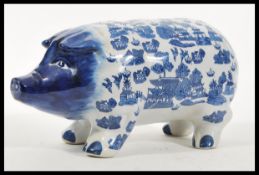 A vintage 20th Century large ceramic money bank bo