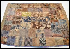 A 20th century patch work bed throw, being brown i