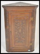 An 18th / 19th Century Georgian oak wall hanging c