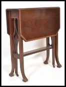 An Edwardian mahogany inlaid drop leaf Sutherland