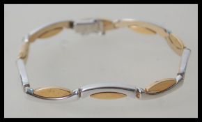 A contemporary hallmarked 9ct gold white and yello