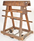 An antique vintage industrial oak framed wooden mi