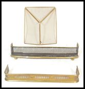 A late 19th Century brass fire fender of smaller p