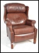A 20th Century ' Leather Sofas of Bath ' tan leather wingback Chesterfield style recliner