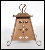 A 20th century Arts and Crafts copper / brass hall  / porch lantern of pagoda form with fret pierced
