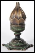A early 20th Century Antique bronze indian incense burner in the form of a Lotus flower, raised on