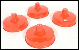 Light Shades - A group of four retro industrial factory style UFO form pendant lampshades having red