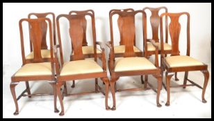 A set of eight 1920's mahogany Queen Anne style splat back dining chairs, the six dining chairs