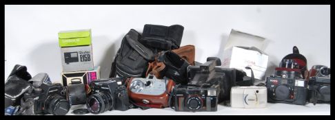 A good collection of vintage 35mm cameras, lenses and accessories  to include Praktika, Zeiss Ikon