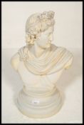 A 20th Century  stone composite bust of Apollo Bel