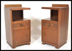 A true pair of early 20th Century circa 1940's oak bedside cabinets, each with a open recess with